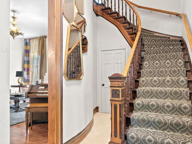 stairway featuring hardwood / wood-style flooring