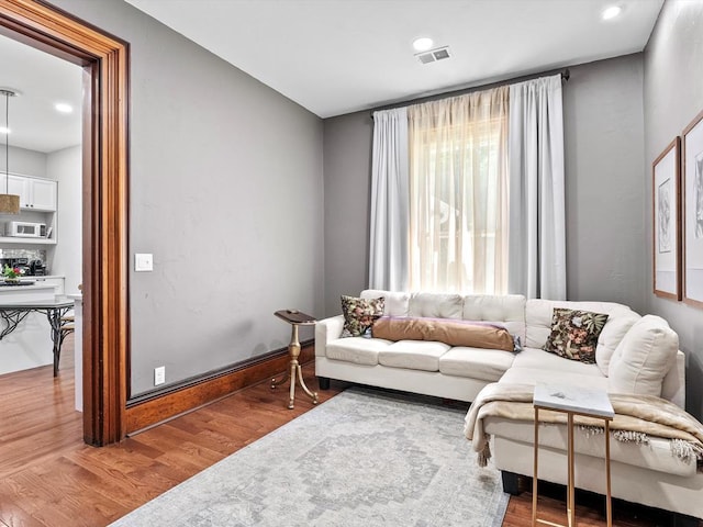 living room featuring hardwood / wood-style flooring