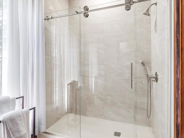 bathroom featuring an enclosed shower