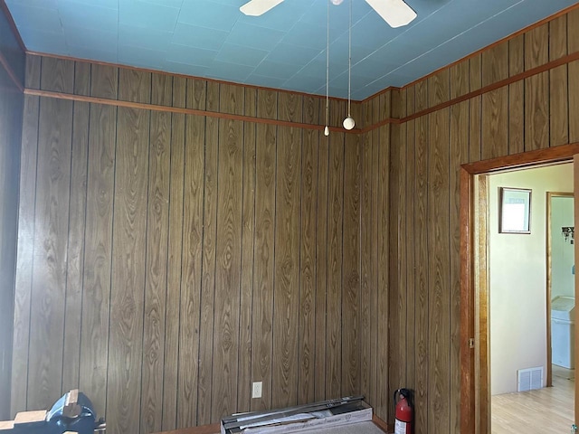 157 E 2nd St, Glidden, WI 54527 - misc room with wood walls and light hardwood / wood-style floors