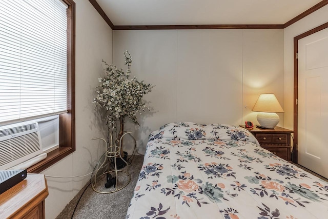 carpeted bedroom featuring multiple windows and ornamental molding