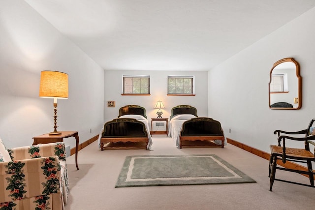 sitting room featuring light colored carpet