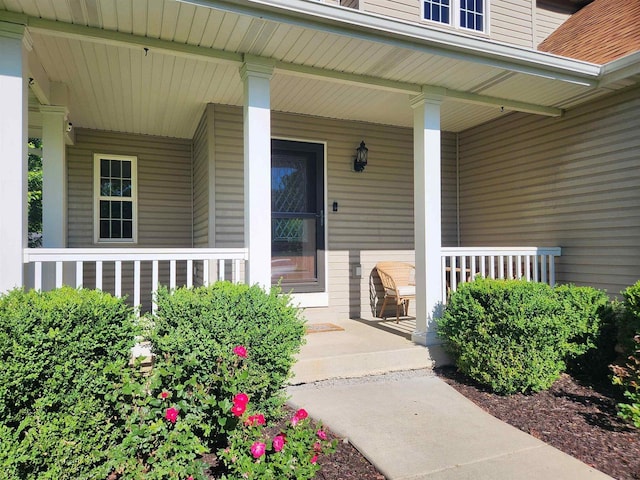 doorway to property with covered porch