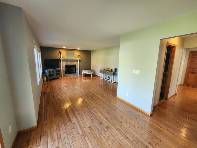 unfurnished living room with light hardwood / wood-style flooring