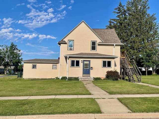 view of front property featuring a front yard