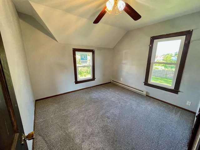 bonus room with ceiling fan, vaulted ceiling, carpet floors, and a baseboard heating unit