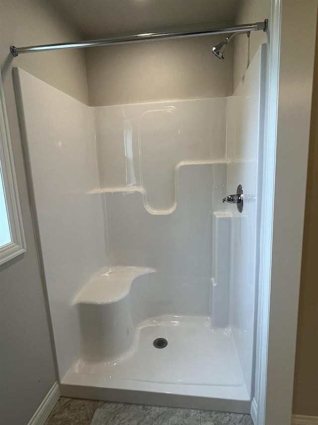 bathroom with walk in shower