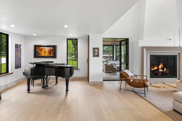 sitting room featuring light hardwood / wood-style flooring and a wealth of natural light