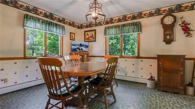 dining area with a baseboard radiator