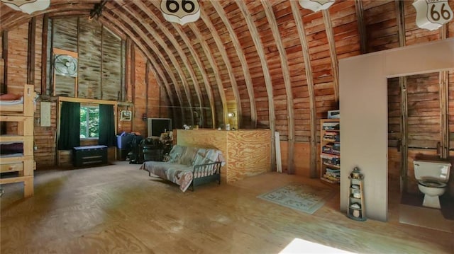 interior space with high vaulted ceiling