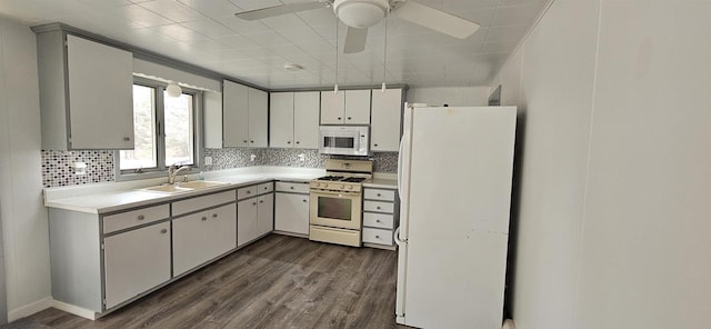N9451 Parkway Rd, Crivitz, WI 54114 - kitchen with white appliances, dark wood-style flooring, and light countertops