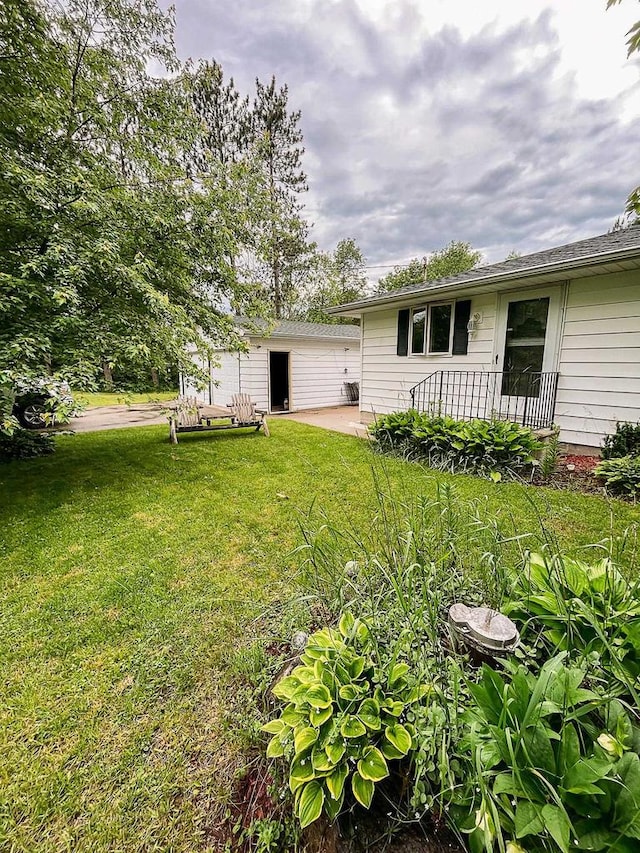 N9451 Parkway Rd, Crivitz, WI 54114 - view of grassy yard with an outbuilding