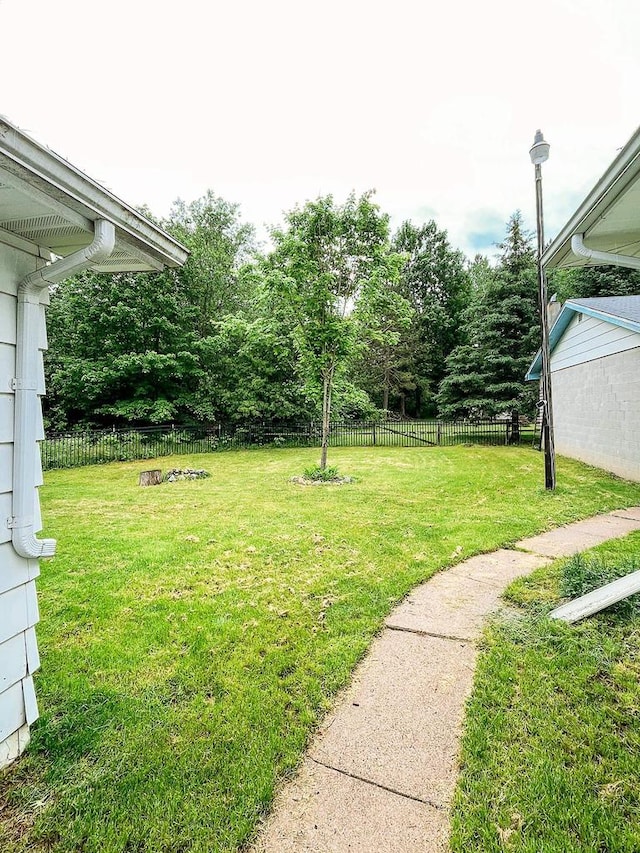 N9451 Parkway Rd, Crivitz, WI 54114 - view of yard with view of wooded area