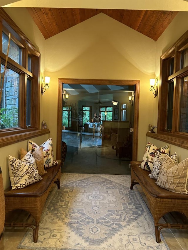 interior space with wood ceiling and vaulted ceiling