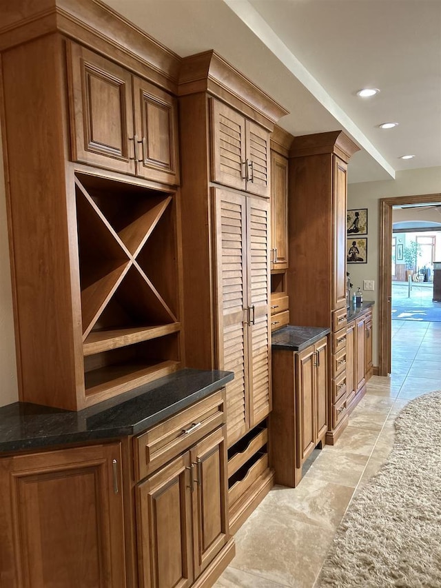 bar with dark stone counters