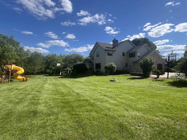 view of yard featuring a playground