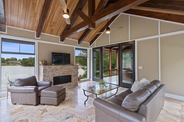 living room with high vaulted ceiling, french doors, ceiling fan, a fireplace, and beam ceiling