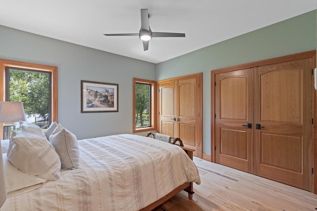 bedroom featuring ceiling fan and light wood-type flooring