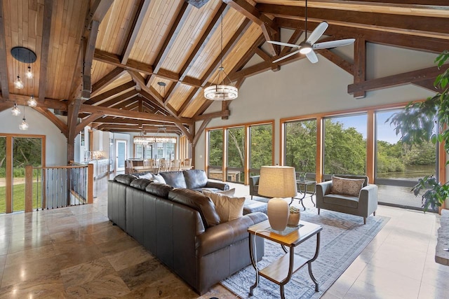 living room with beam ceiling, ceiling fan, and high vaulted ceiling