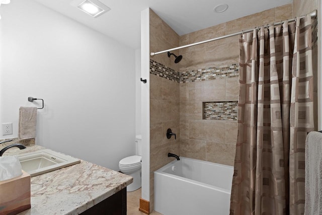 full bathroom with vanity, toilet, and shower / tub combo with curtain