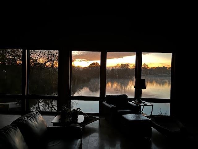 sunroom with a water view