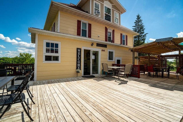 wooden terrace featuring a pergola