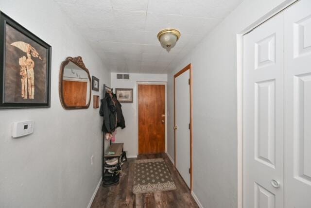 hallway featuring hardwood / wood-style floors