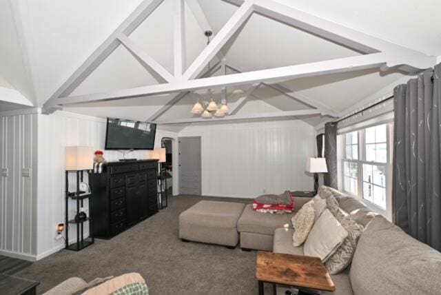 carpeted living room featuring a chandelier and lofted ceiling