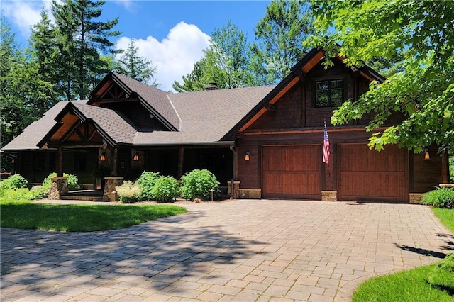 view of front of property with a garage