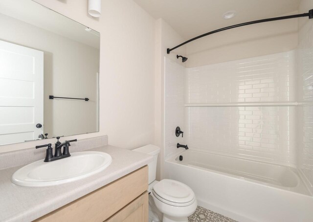 full bathroom featuring vanity, toilet, and tub / shower combination