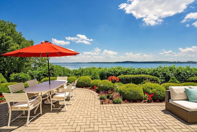 view of patio / terrace featuring a water view