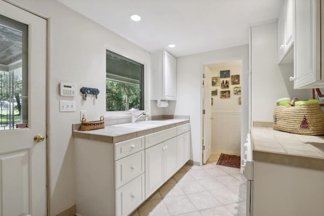 bathroom featuring vanity and tile patterned floors