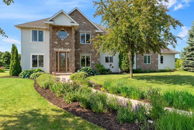 view of front of house with a front lawn