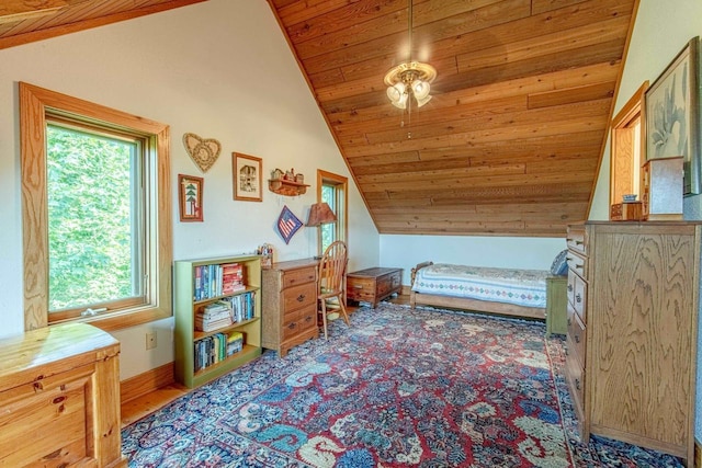 bedroom with wood ceiling and vaulted ceiling