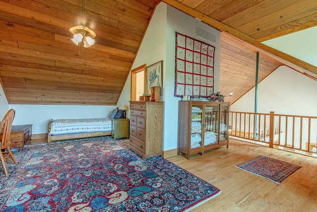 bedroom with wood-type flooring and wooden ceiling