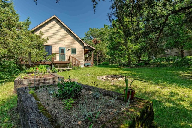 view of yard featuring a deck