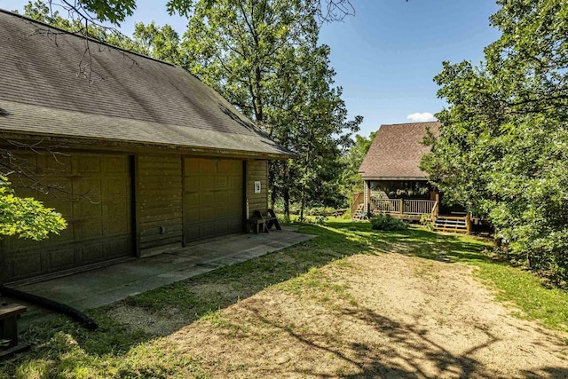 view of yard featuring a garage