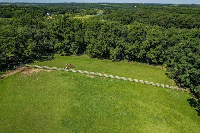 birds eye view of property with a rural view