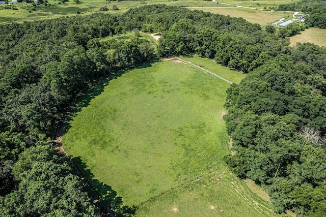 birds eye view of property featuring a rural view