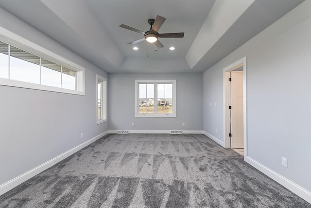 1421 Greenleaf Ct, Sun Prairie, WI 53590 - empty room with a ceiling fan, carpet floors, baseboards, a tray ceiling, and recessed lighting