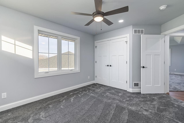 1421 Greenleaf Ct, Sun Prairie, WI 53590 - unfurnished bedroom featuring dark carpet, baseboards, recessed lighting, a closet, and a ceiling fan