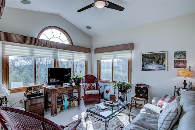 living room with ceiling fan and lofted ceiling