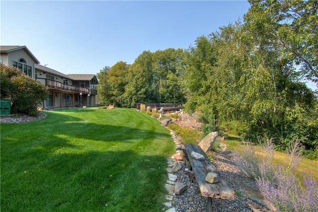 view of yard with a deck