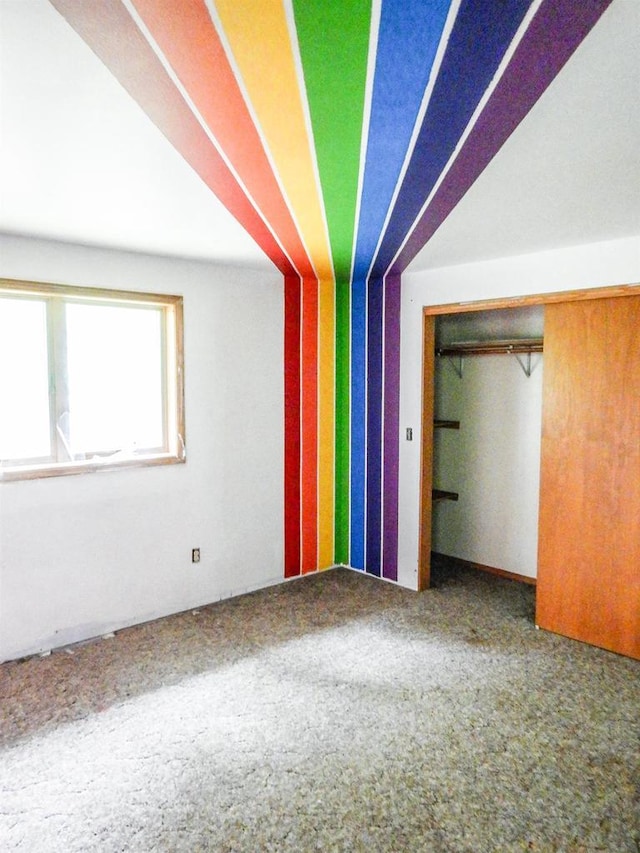 441 Washington St, Oconto, WI 54153 - unfurnished bedroom with carpet floors and a closet