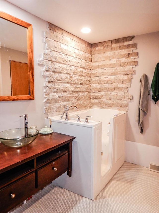 441 Washington St, Oconto, WI 54153 - bathroom with vanity and a bathtub