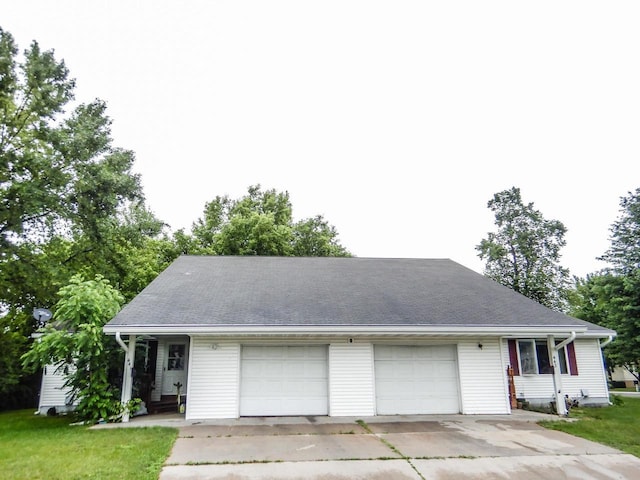 441 Washington St, Oconto, WI 54153 - view of front of home with a front yard and a garage
