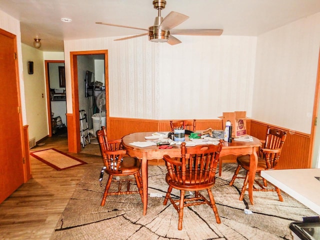 441 Washington St, Oconto, WI 54153 - dining area with light hardwood / wood-style flooring and ceiling fan