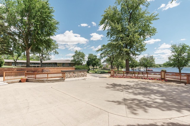 view of patio featuring a water view