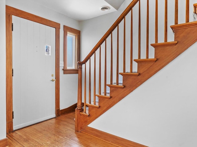 entryway with light hardwood / wood-style floors