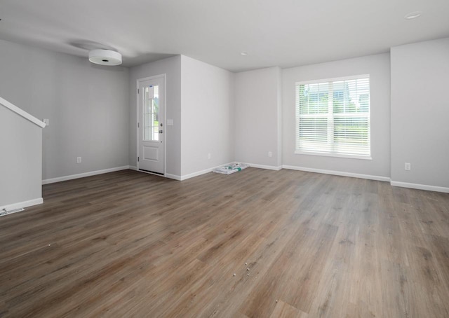 interior space with hardwood / wood-style flooring